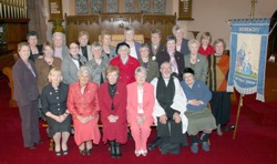 Derriaghy Parish Mothers’ Union and guests, pictured at a service of thanksgivingmarking the 50th anniversary of the branch.  L to R: (seated) Mrs Maud Ryan (Area Chairman), Mrs Margaret Crawford (All Ireland President), Mrs Moira Thom (Diocesan President), Mrs Trudy Hull (Branch Chairman), the Rev John Budd, Rector and Mrs Ruby Magill.
